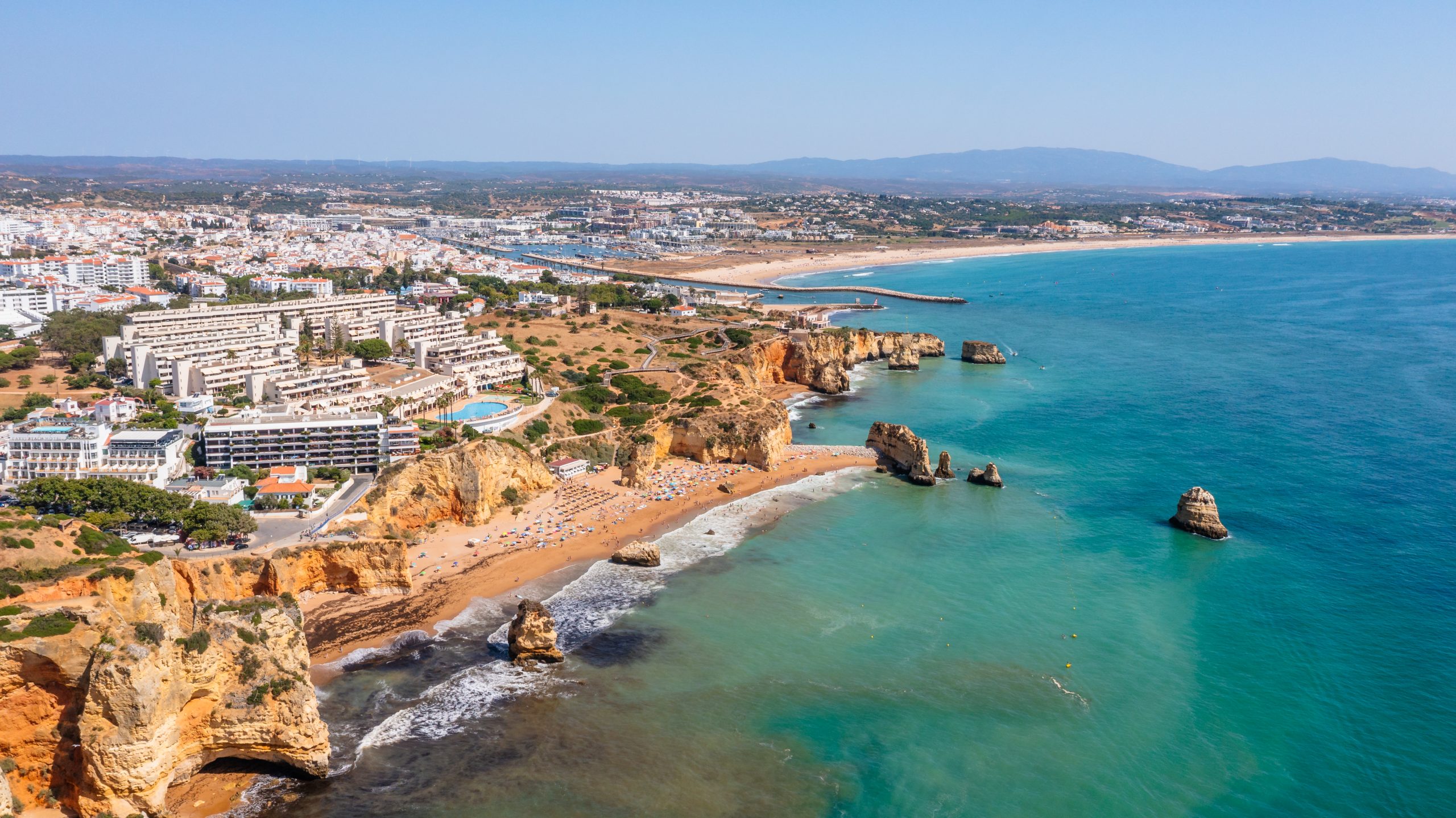 View of properties and beach in Algarve